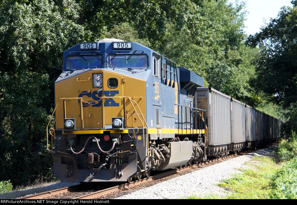 CSX 905 pushes on the rear of a loaded coal train